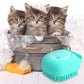 Three playful kittens in a bubble-filled tub with a teal silicone pet grooming brush for washing and massaging.