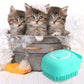 Three playful kittens in a bubble-filled tub with a teal silicone pet grooming brush for washing and massaging.