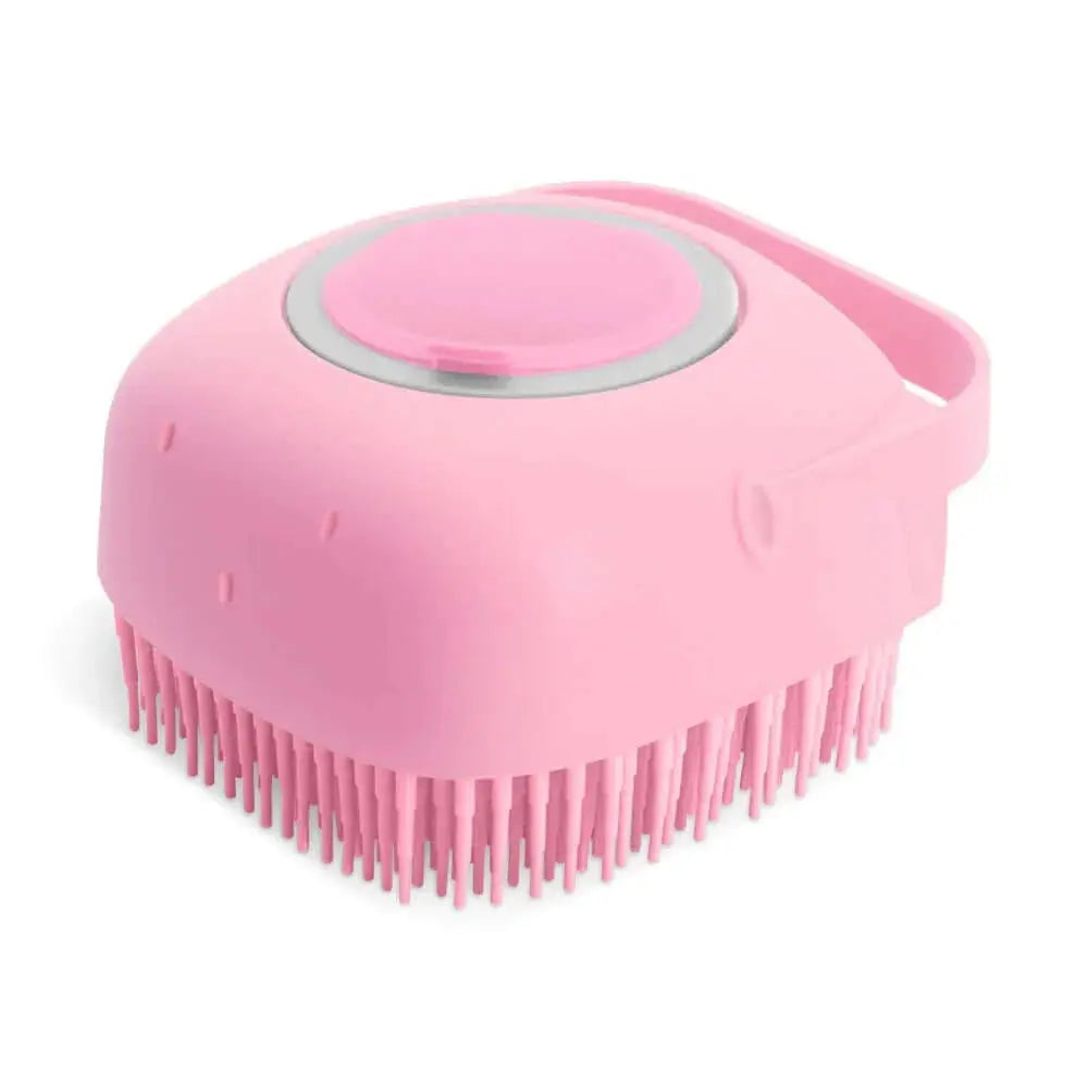 Pink pet dog shampoo massager brush with silicone bristles for grooming and bathing short hair pets.