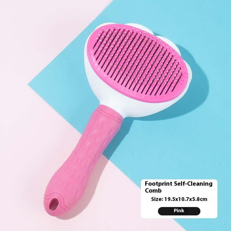 Pink self-cleaning pet grooming comb for dogs and cats, featuring a footprint design and ergonomic handle.