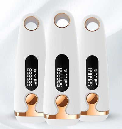 Three laser hair removal devices with LCD displays, designed for home use, featuring adjustable gears and a sleek white and gold design.