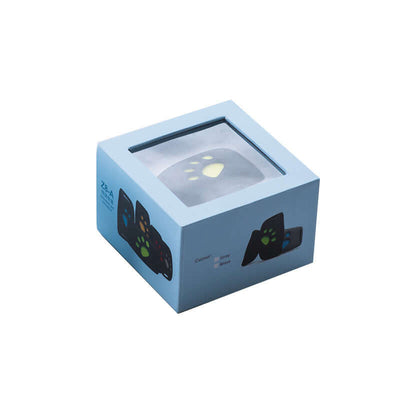 Waterproof GPS locator and pet tracker packaging in blue box with paw print design.