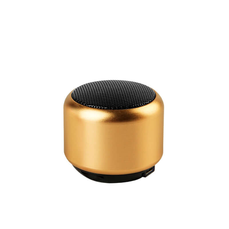 Portable outdoor mini speaker in gold with Bluetooth connectivity and superior audio quality.