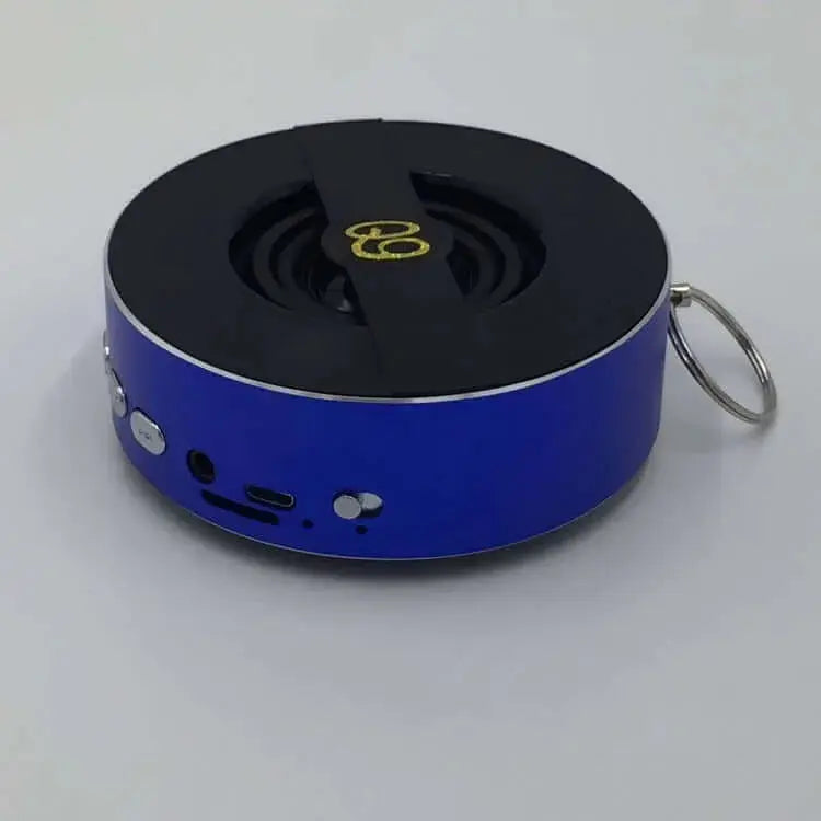 Nevytech Compact blue Bluetooth speaker model Q9A with USB and AUX ports, perfect for outdoor use with 8 hours playtime.