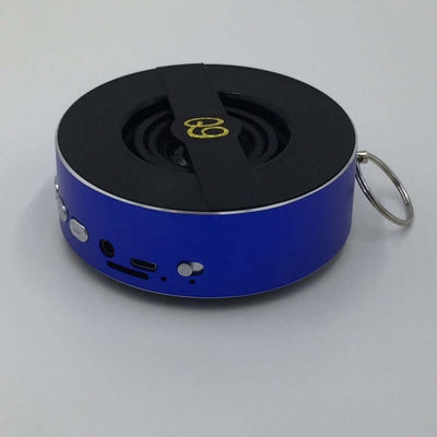 Compact blue Bluetooth speaker model Q9A with USB and AUX ports, perfect for outdoor use with 8 hours playtime.