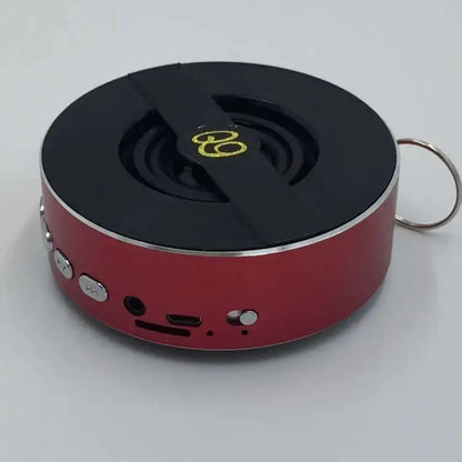 Nevytech Compact red Bluetooth speaker Q9A with mono output, USB charging, and 10m transmission distance for outdoor use.