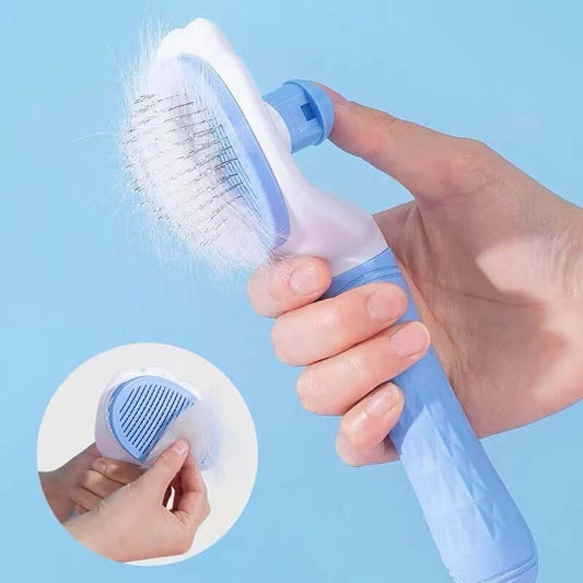 Hand holding a blue pet hair removal gadget comb for effective grooming of cats and dogs.