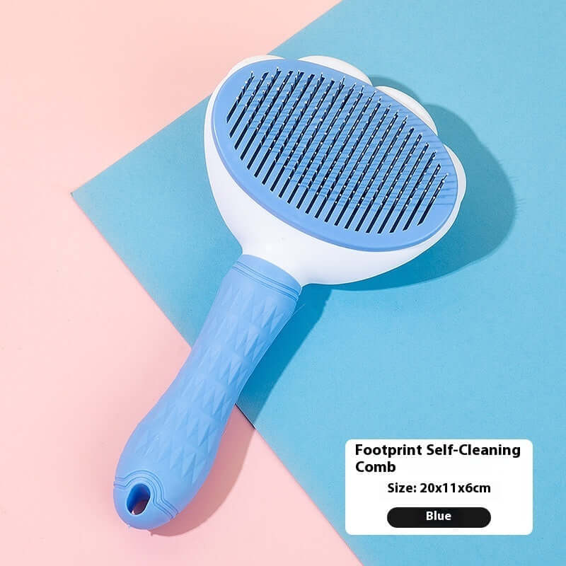 Blue footprint self-cleaning comb for pets, perfect for removing hair and keeping your furry friend groomed.
