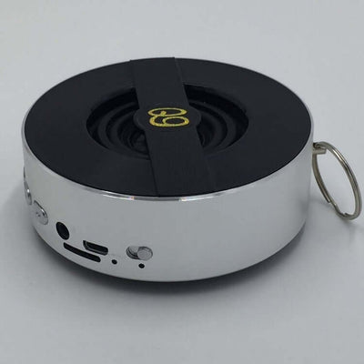 Bluetooth speaker Q9A with mono output, USB port, and compact design for outdoor use.