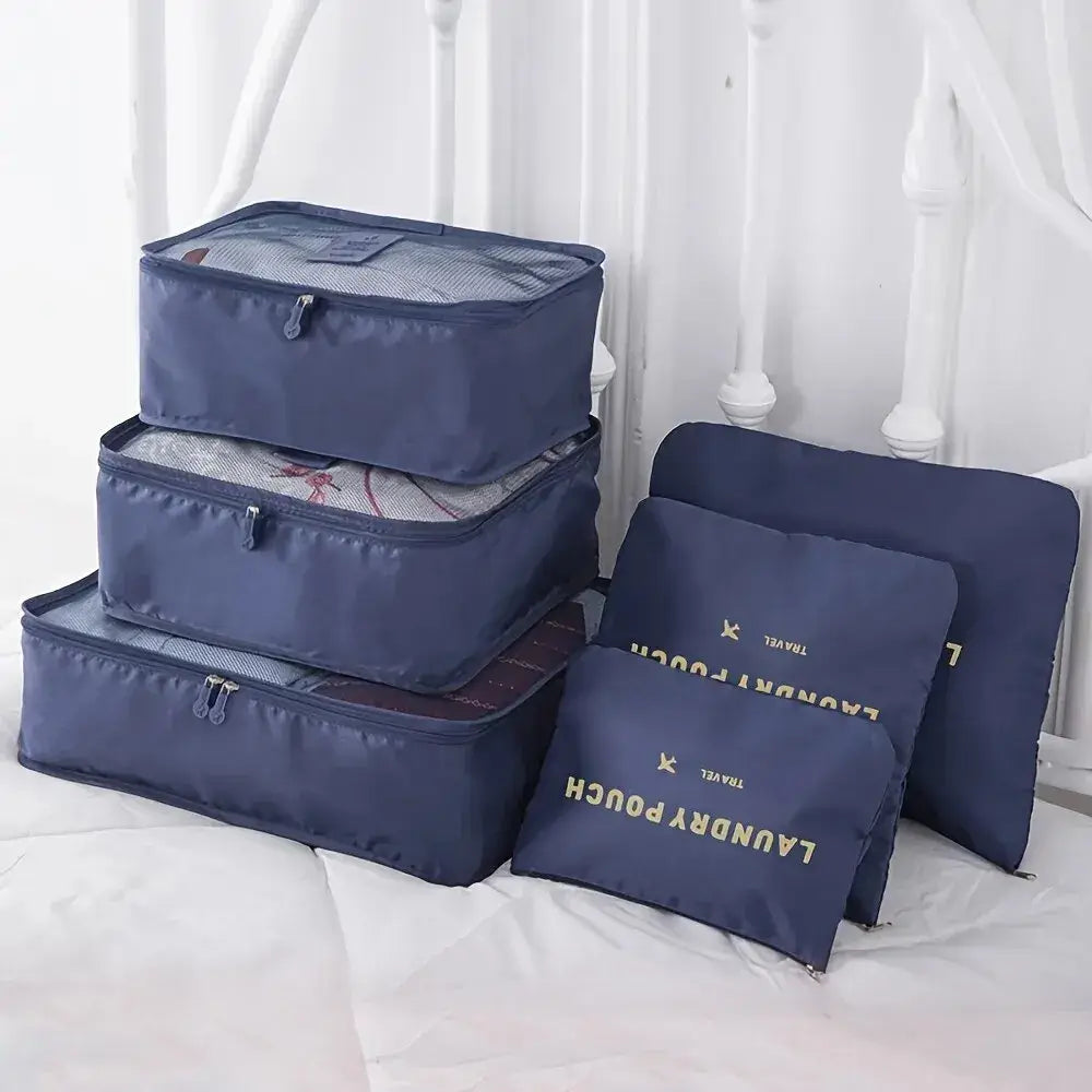 6pcs blue travel packing cubes for organized storage of clothes, shoes, and accessories.
