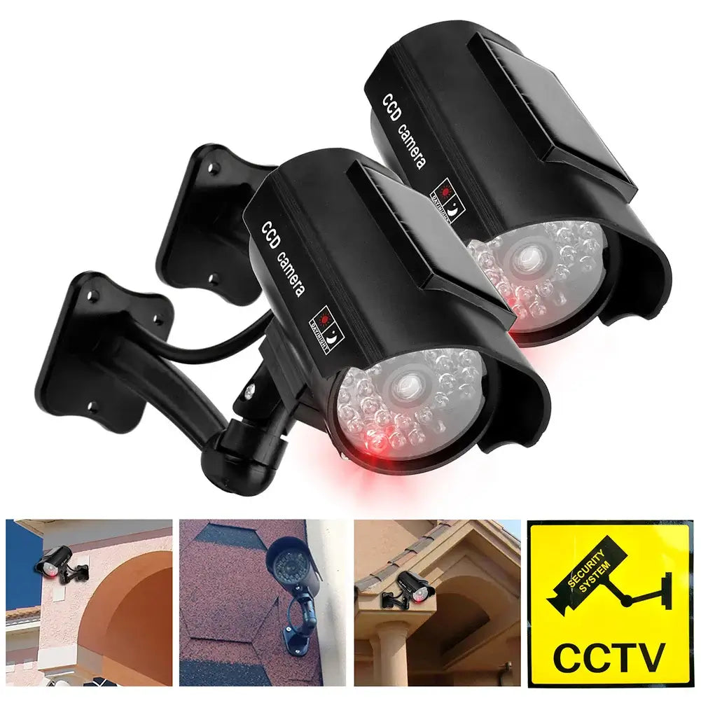 Dummy CCTV camera with flashing red LED lights, designed for indoor and outdoor theft deterrent use.