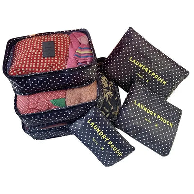 6pcs travel luggage packing cubes with polka dot design, ideal for organizing clothes and laundry during trips.
