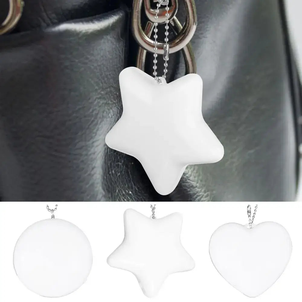 LED handbag light in star shape with keychain clip, ideal for purses, available in heart, round, and star design.