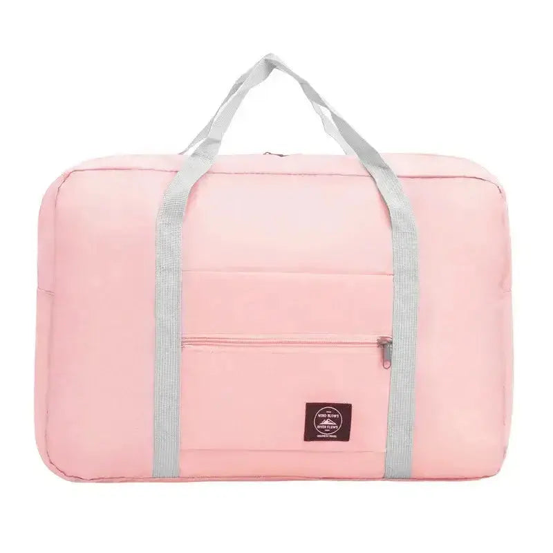 Nevytech Women’s Travel Handbag Waterproof in blue and pink colors displayed on a wooden chair.