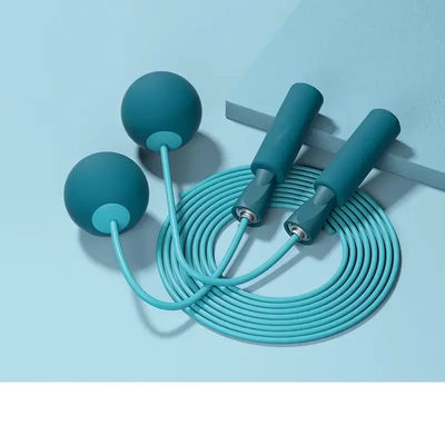 Cordless skipping rope in turquoise color with heavy balls for fitness training and aerobics workout.