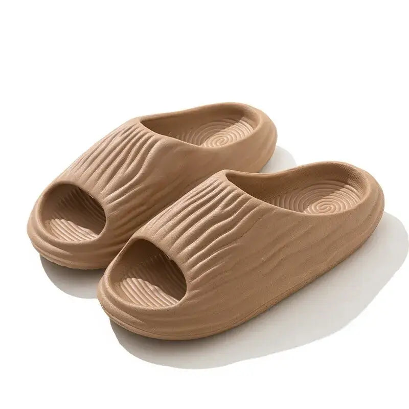 Unisex EVA thick-soled non-slip odor-resistant outdoor slippers for men and women, ideal for home and casual wear.