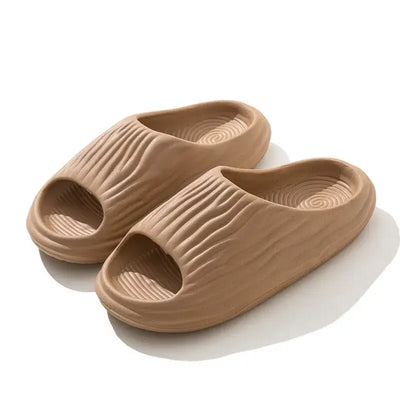 Unisex EVA thick-soled non-slip odor-resistant outdoor slippers for men and women, ideal for home and casual wear.