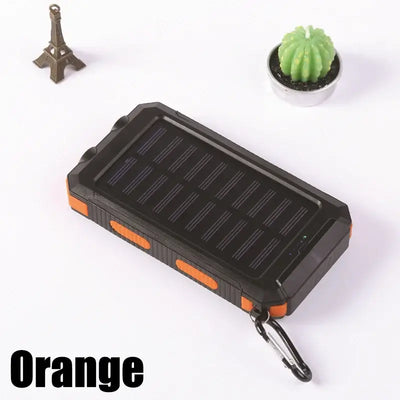 Orange portable solar power bank with LED light, waterproof, suitable for outdoor use