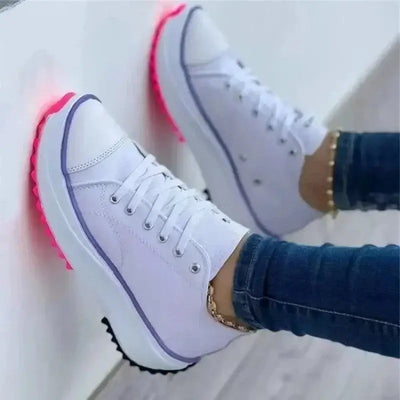 Autumn new women's canvas tennis shoes – breathable high-top casual female footwear with thick soles and lace-up vulcanized design.