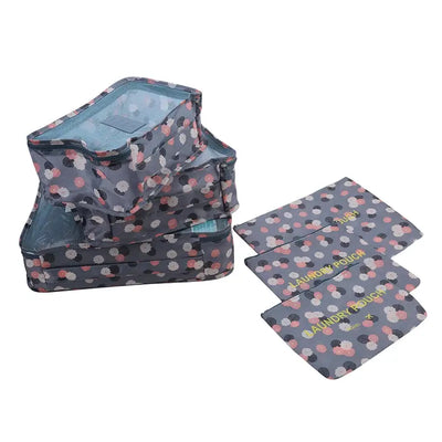 6pcs travel luggage packing cubes in polka dot design, perfect for organizing clothes and laundry items.