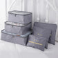 Nevytech 6Pcs Travel Packing Cubes Set organized inside a suitcase for efficient packing.