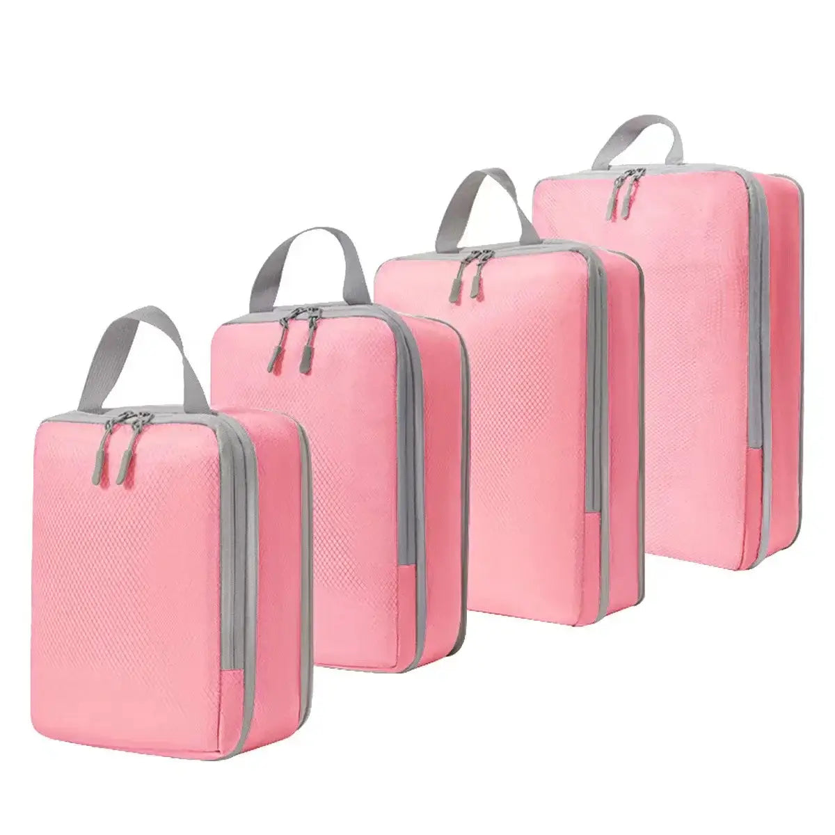 Set of four pink ultralight packing cubes for travel, designed for effective compression and organization.