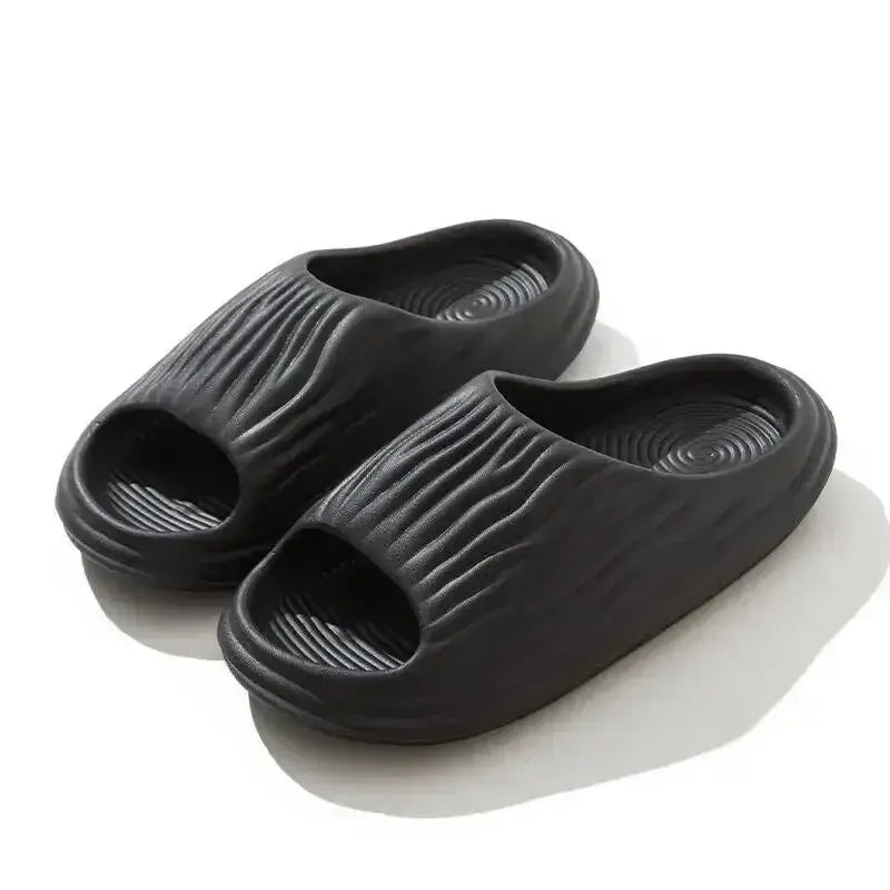 Unisex EVA thick-soled non-slip odor-resistant outdoor slippers for men and women, ideal for home and casual wear.