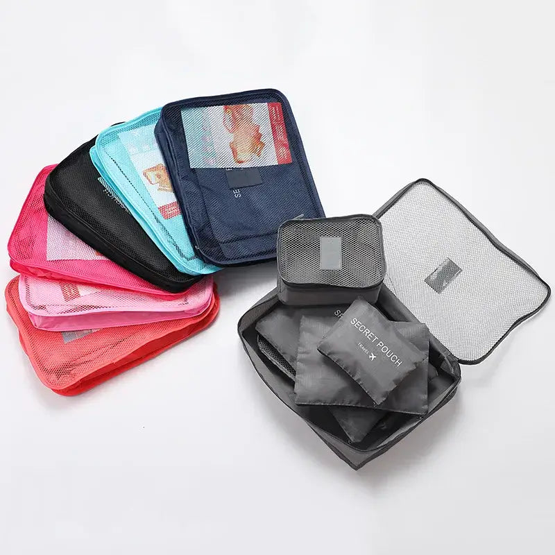 6Pcs travel clothes storage bags set in various colors, organized for suitcase packing and travel needs.