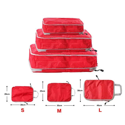 Set of foldable and compressible red packing cubes in three sizes for travel storage and organization.