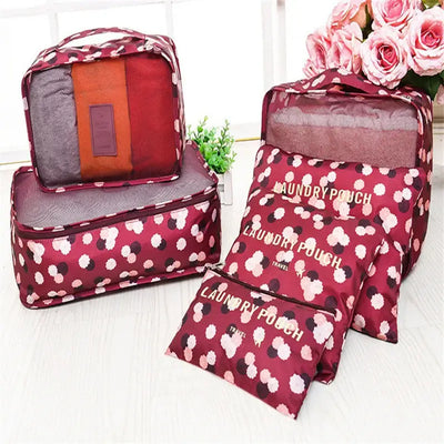 6pcs travel luggage packing cubes in maroon with laundry pouches, ideal for organizing clothing and accessories.