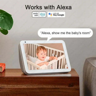 Smart display showing a child in a crib with Alexa integration for voice commands.