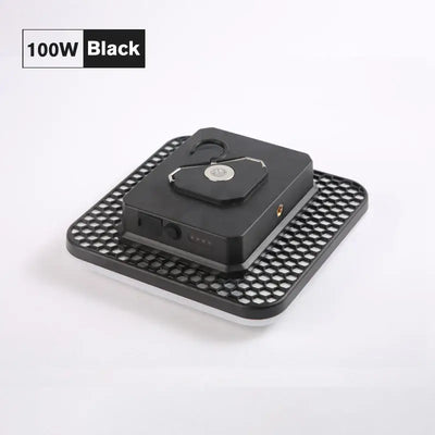 100W black portable LED camping lantern on a perforated tray, designed for outdoor lighting and emergency use.
