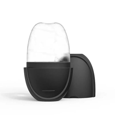 Ice roller for face and eyes in black holder, perfect for skincare and relieving puffiness.
