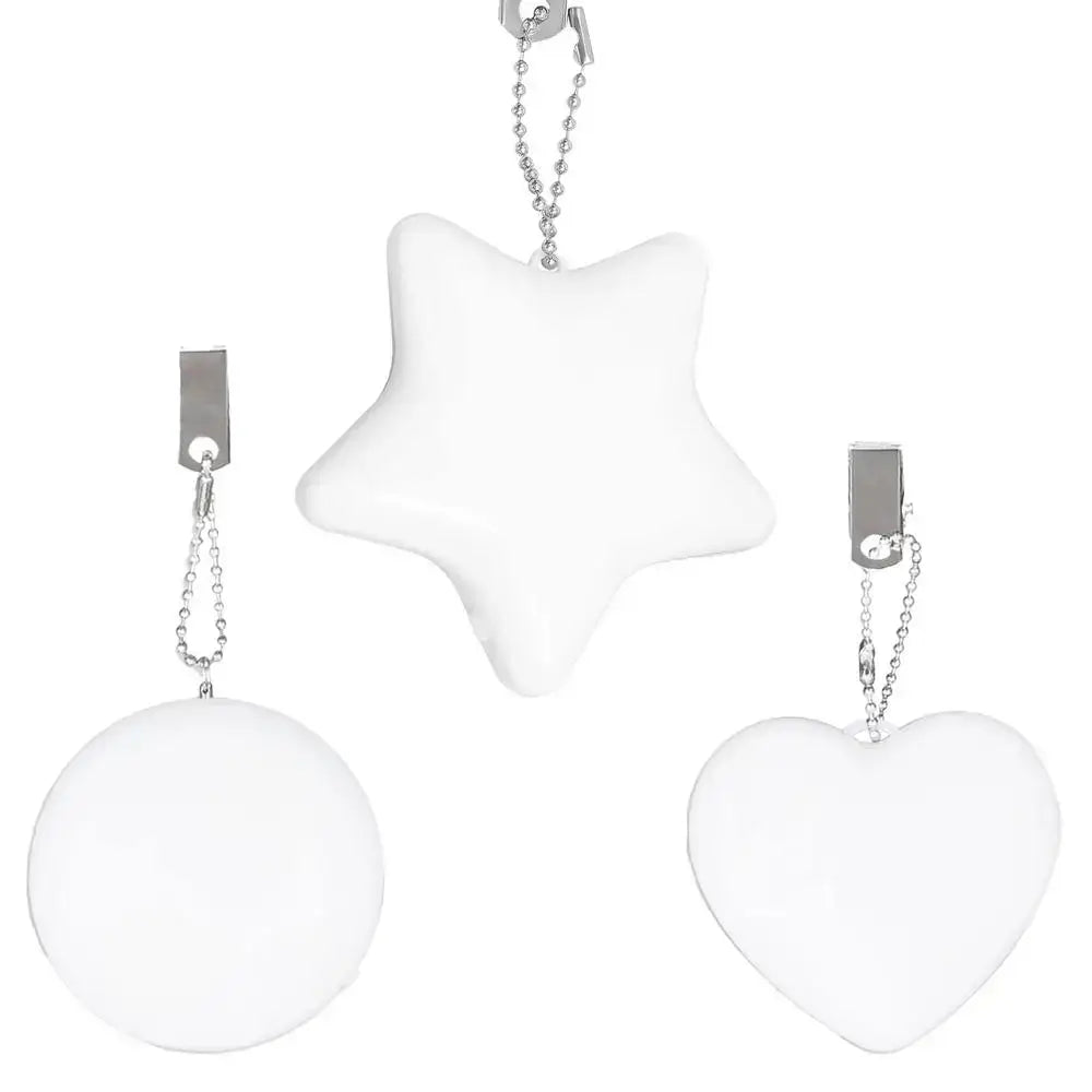LED handbag lights in heart, star, and round shapes with keychain clips, ideal for purses and night lighting.