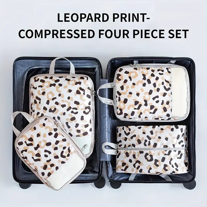 Leopard print four-piece compressed storage bag set inside a suitcase for efficient packing.