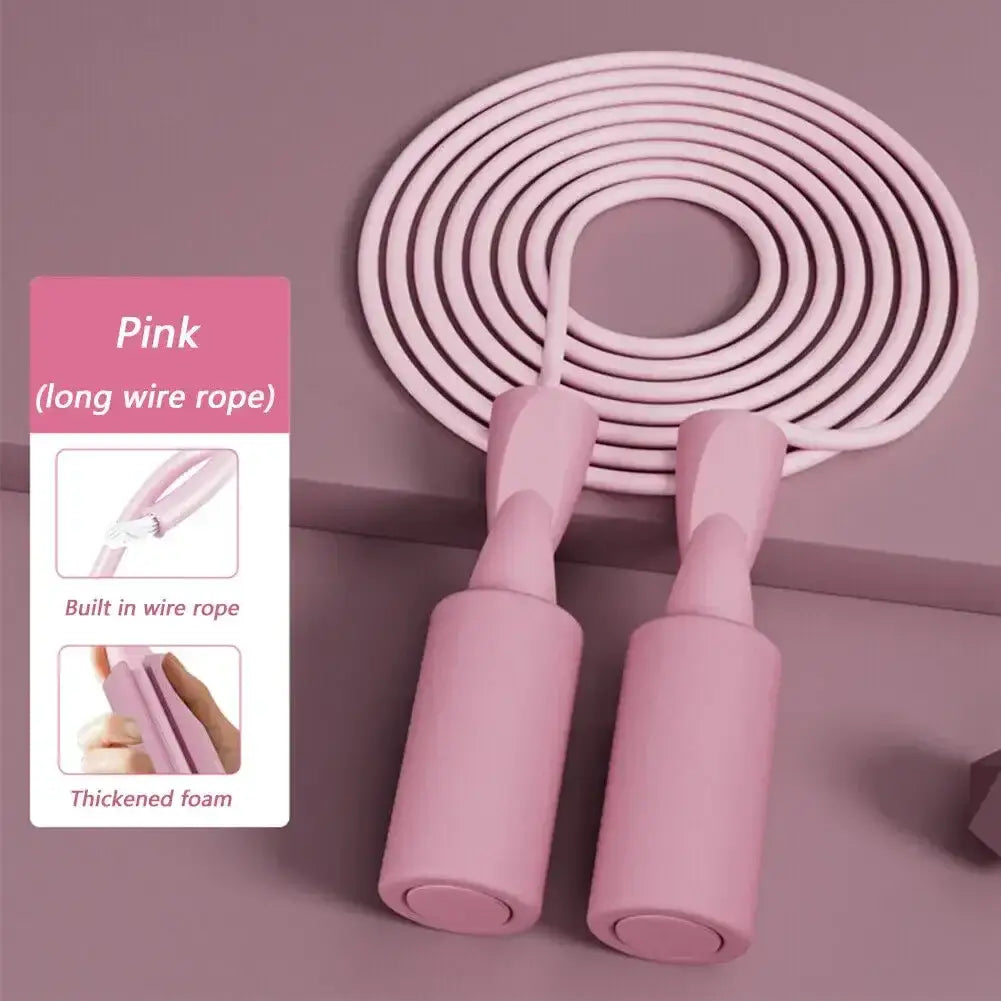 Pink cordless skipping rope with thickened foam handles for fitness training and aerobics, featuring a built-in wire rope.