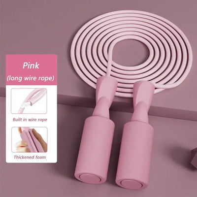 Pink cordless skipping rope with thickened foam handles for fitness training and aerobics, featuring a built-in wire rope.