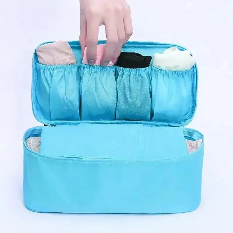 Nevytech 6Pcs Travel Luggage Packing Cubes organized in pink suitcase with laundry pouch and clothing.