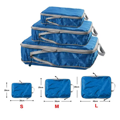 Set of three foldable, waterproof packing cubes in blue, designed for travel storage and organization.
