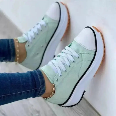 Autumn new women's canvas tennis shoes – breathable high-top casual female footwear with thick soles and lace-up vulcanized design.