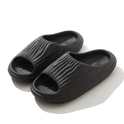Unisex EVA thick-soled non-slip odor-resistant outdoor slippers for men and women, ideal for home and casual wear.
