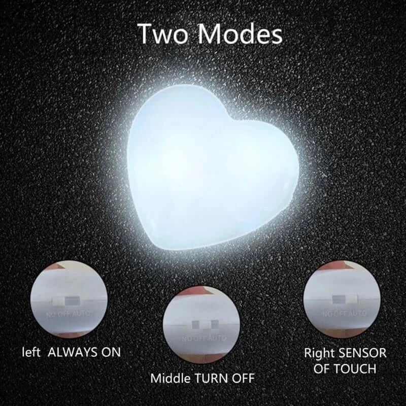Heart-shaped LED light showing two modes: always on and sensor of touch, ideal for purse decoration.
