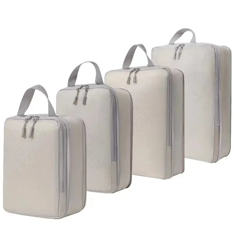 Nevytech 4 Set Compression Packing Cubes in light gray, designed for efficient travel organization and space-saving.