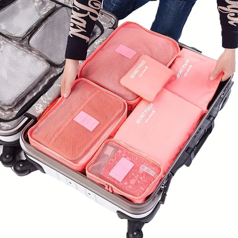 Nevytech 6Pcs Travel Packing Cubes Set organized inside a suitcase for efficient packing.