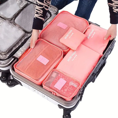 Packing cubes organized in a suitcase for efficient travel storage and organization.