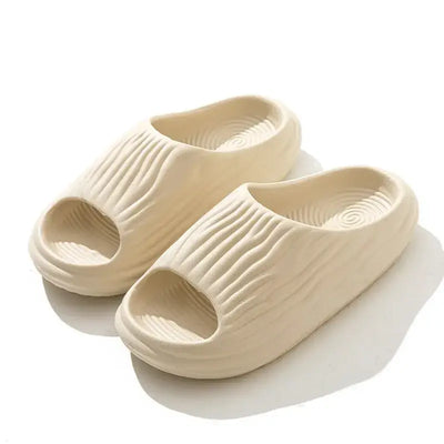 Unisex EVA thick-soled non-slip odor-resistant outdoor slippers for men and women, ideal for home and casual wear.