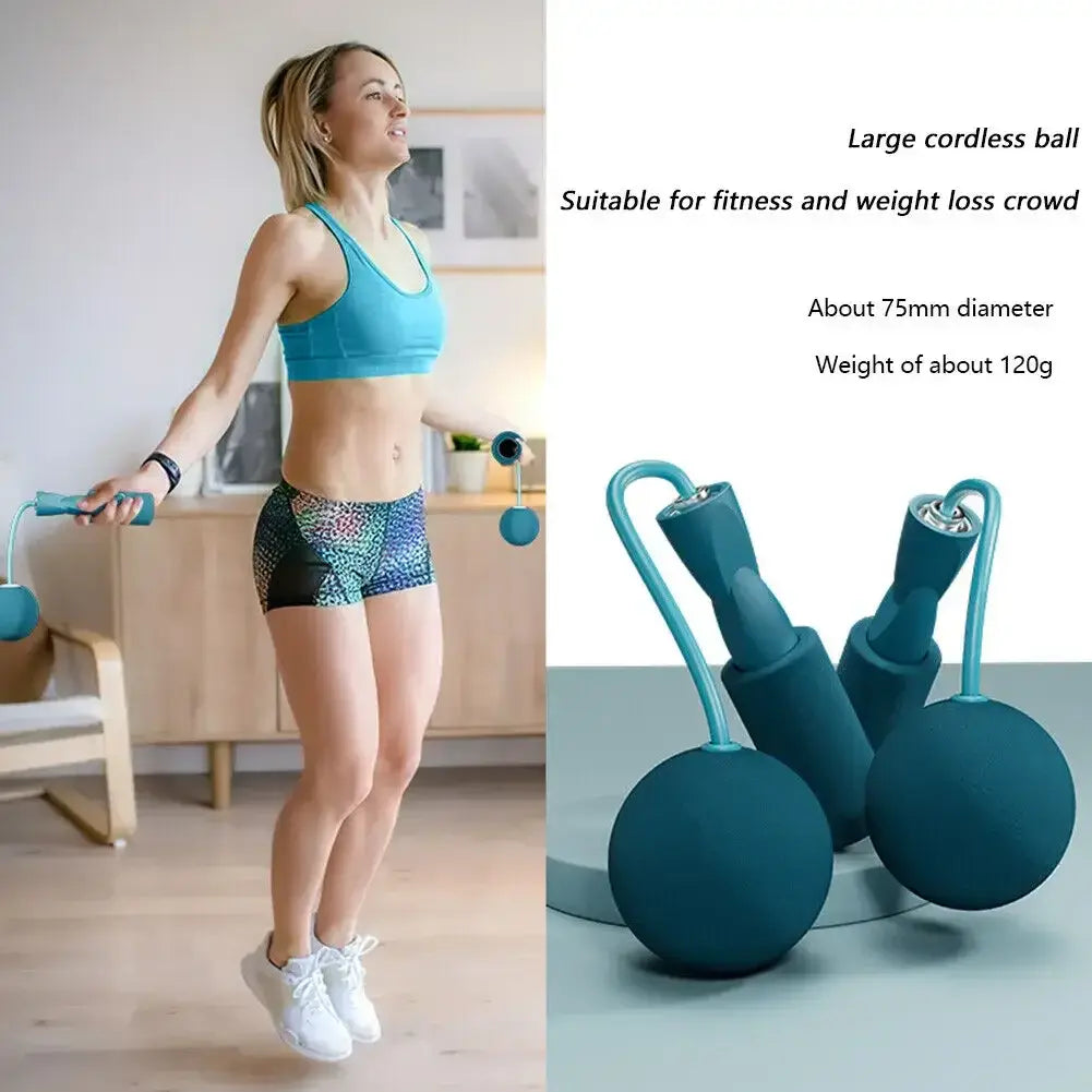 Woman using a large cordless skipping rope with a heavy ball for fitness training, showcasing exercise and weight loss.