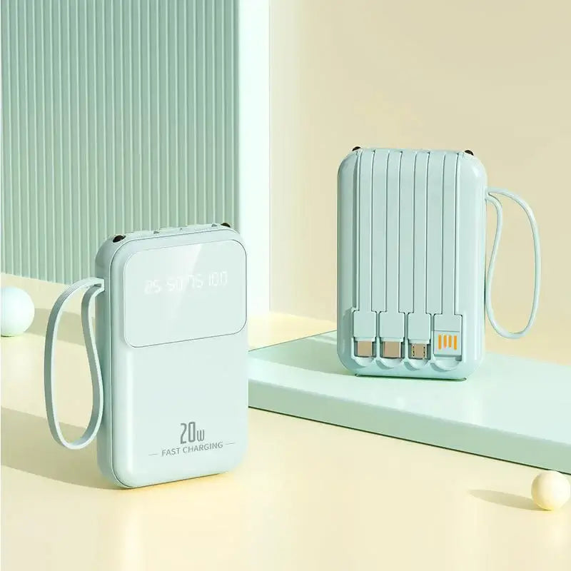Portable 20000mAh power bank with digital display, fast charging, and compact design in light blue.
