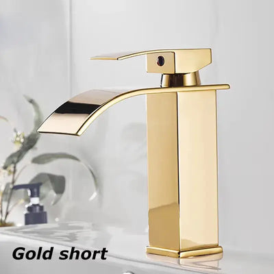Gold short bathroom sink faucet with contemporary design and sleek lines, ideal for modern washbasin installations.