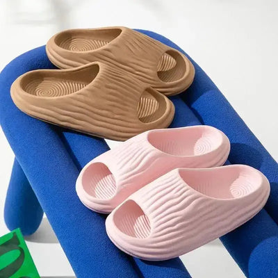 Unisex EVA thick-soled non-slip odor-resistant outdoor slippers for men and women, ideal for home and casual wear.